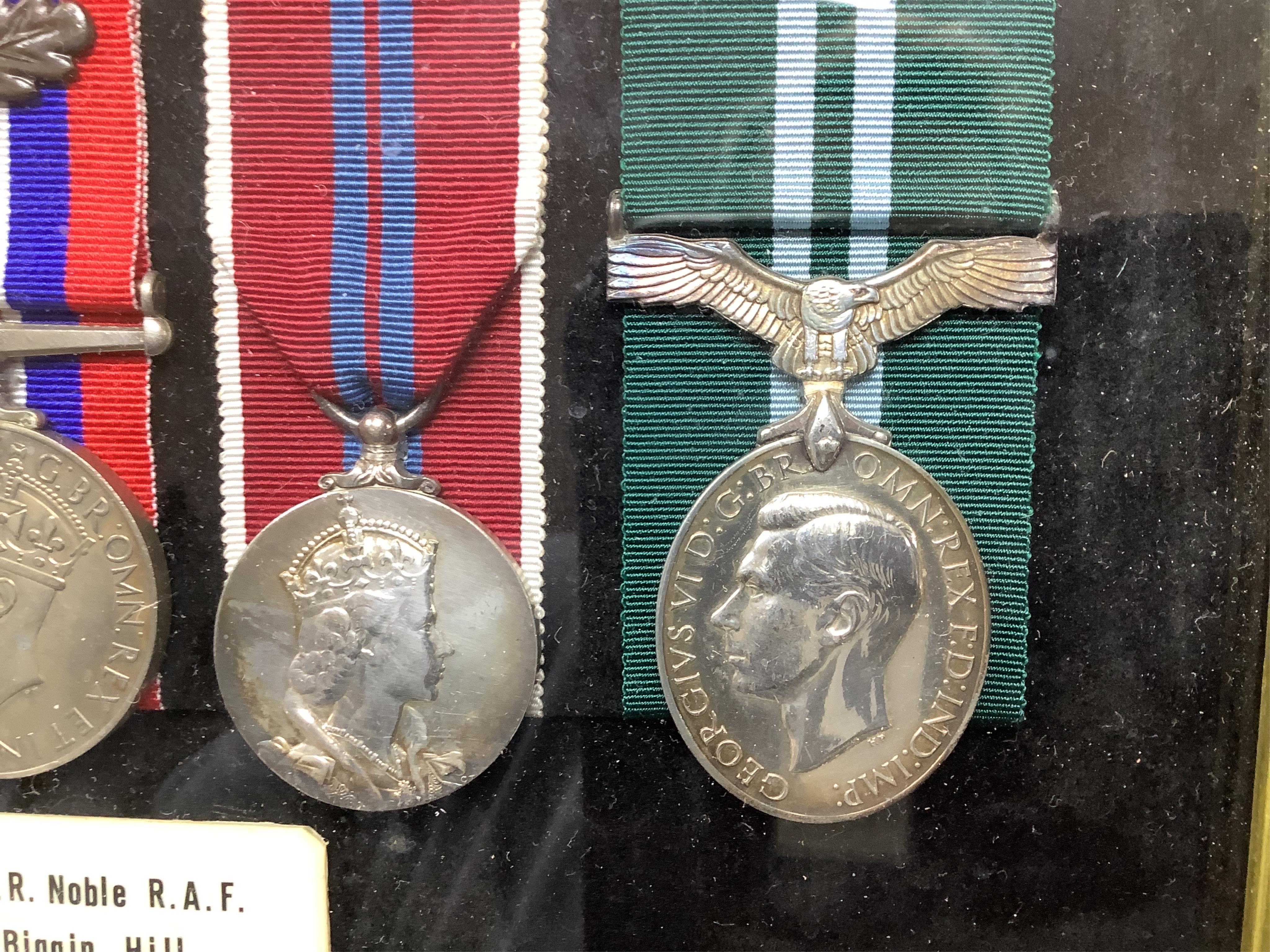 A framed WWII RAF medal group awarded to Wing Commander Brian Robert Noble, comprising;, The 1939-1945 Star, with clasp for the Battle of Britain, The Air Crew Europe Star, The Defence Medal, The British War Medal, The 1